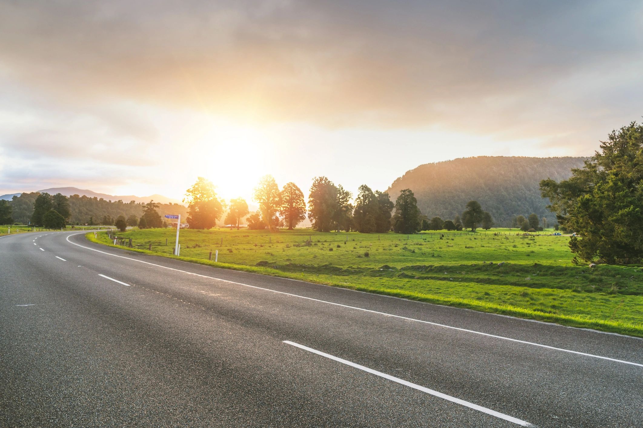 Simple car driving image on an open road