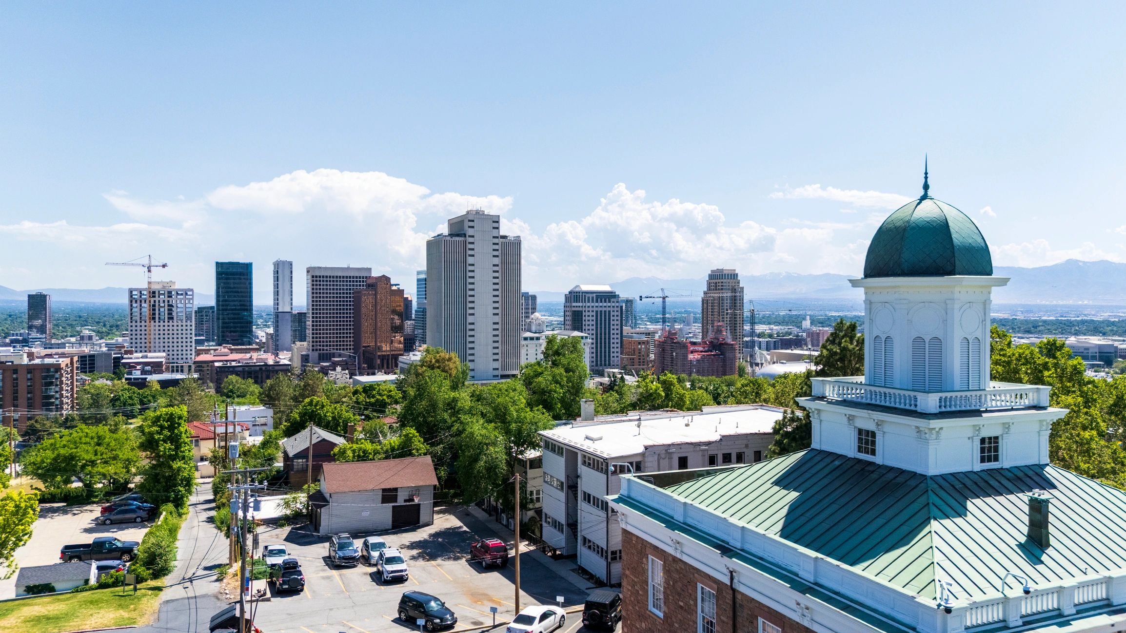 Commercial city property and skyline representing long-term asset stewardship